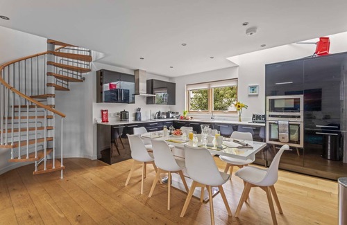 Talland House | Gorgeous home known as the Sky Deck due to its innovative design with large terrace on the roof allo