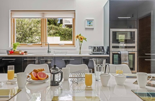 Talland House | Gorgeous home known as the Sky Deck due to its innovative design with large terrace on the roof allo