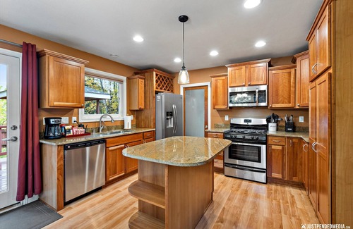 Eagle River House | Gorgeous Mountain Views, peaceful retreat with Hot Tub, Fenced Yard & Huge Deck!