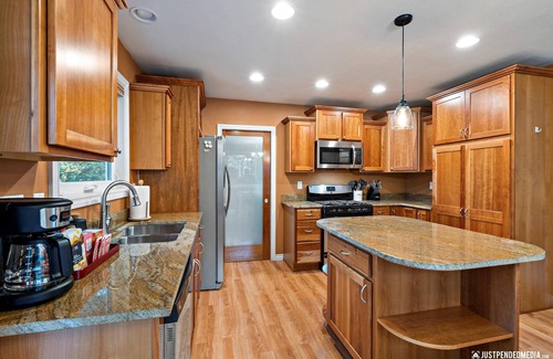 Eagle River House | Gorgeous Mountain Views, peaceful retreat with Hot Tub, Fenced Yard & Huge Deck!