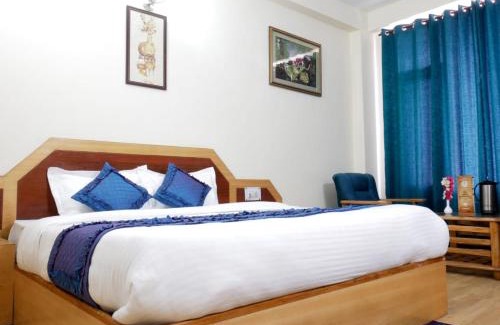 Manali Hotel | Goroomgo New Ambika Mall Road Manali - Prime-location-and-Spacious-Room with Luxury Room And parking Facilities