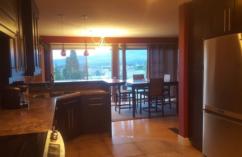 Vernon House | Gourmet kitchen, luxurious bath A/C, gas fireplace, BBQ & private backyard patio