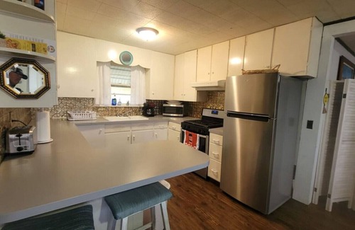 Grand Rapids House | Gr Sunshine Lakefront Cottage · Lakefront King bed firept, hot swim pool spa, swim