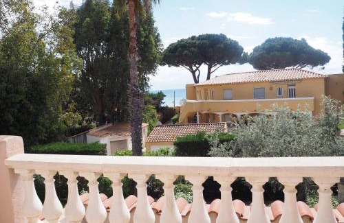 Cavaliere House | Grain de sable, les pieds dans l'eau