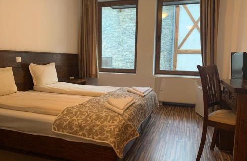 Shiligarnika Apartment | Granat next to Ski Lift by BookVillaBG