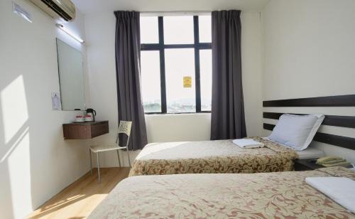 Downtown George Town Hotel | Grand Inn Hotel - Macalister Road