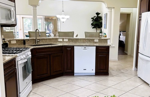 Santiago House | Great location.Climate-controlled lanai & NEW 2024 4-SEATER GOLF CART INCLUDED!