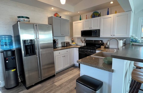 Green Creek House | Great Striper Fishing! Bay Front Cottage Enjoy your Private Dock.