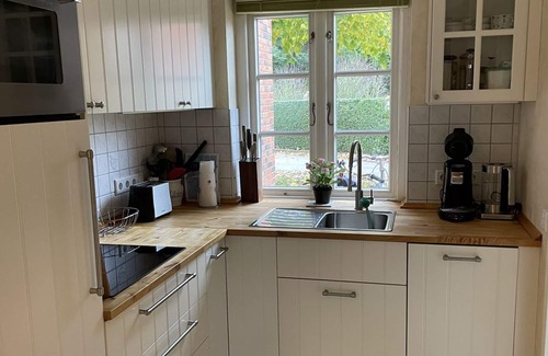 Wyk auf Foehr Apartment | Green Eilun 13 - Modernes Reihenhaus mit Garten, Spielecke, Waldzugang und Nähe zum Südstrand
