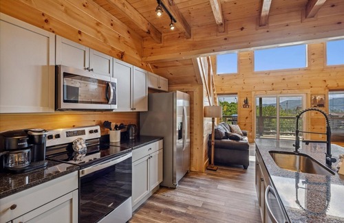 Chalet Village North Cabin | Grizzlies Den 4 Bedroom Cabin by RedAwning