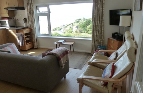 Trenance Apartment | Ground floor apartment in Mawgan Porth with sea views, sleeps 4, dog friendly.