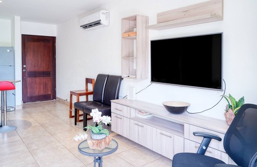 Villarreal Condo | Ground-floor condo with pool & garden views, terrace, hot tub, AC, & W/D