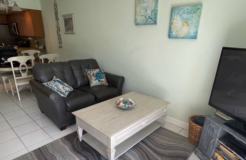 Point East Condo | Ground floor sea views - poolside on non-driving beach