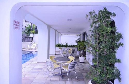 Jardim Praiano Apartment | Guaruja - 2 Quartos - Ar condicionado - Varanda