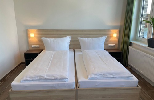 Pasewalk Bed & Breakfast | Guest house apartment 108 - Lokschuppen Pasewalk- guest houses with double rooms, single rooms and