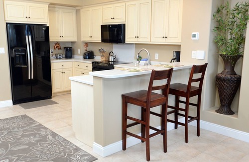 Thomas Drive Condo | Gulf Crest -Walk In Shower in Master