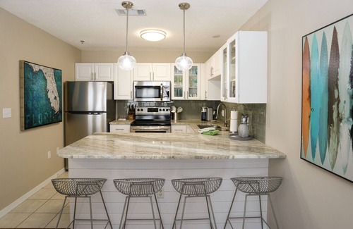 Gulf Place Condo | Gulf Place - Private Beach Access- Heated Pool!