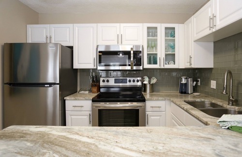 Gulf Place Condo | Gulf Place - Private Beach Access- Heated Pool!