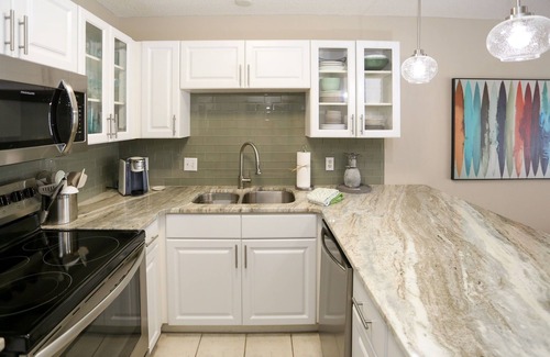 Gulf Place Condo | Gulf Place - Private Beach Access- Heated Pool!