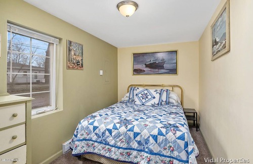 Shelbyville Cottage | Gun Lake Vacation Rental, Sandy beach, docks, picnic tables, kids play grounds