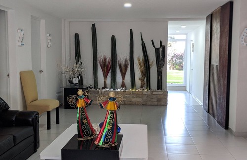 Puebla House | Habitación DELUXE-VIP