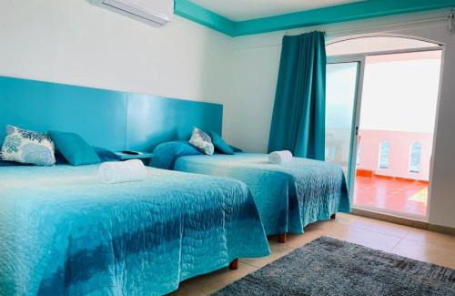 Colonia Meteorologico Apartment | Habitación Amanecer Turquesa #2