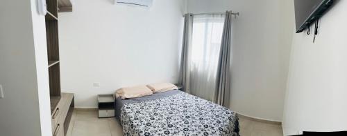 Centro House | Habitación con cama matrimonial