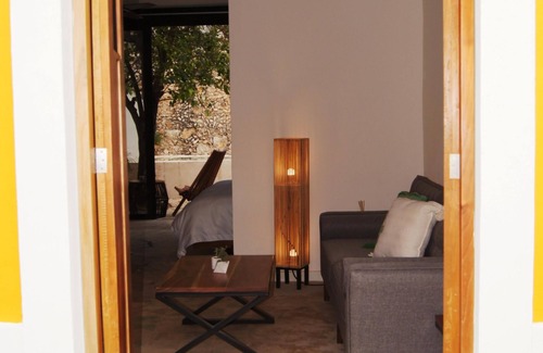 Barrio de Santiago Hotel | Habitación de lujo con king Size en el centro de Mérida.