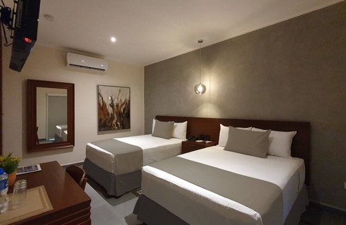 Centro Hotel | Habitaciones cómodas, modernas y limpias en Paseo de Montejo.