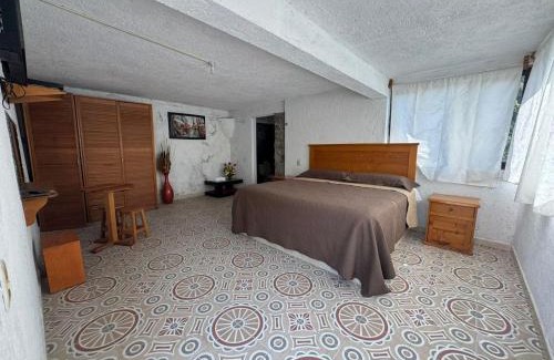 Valle de Bravo Cabin | Habitaciones las cascadas