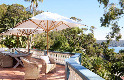Palm Beach House | Hacienda - This remarkable home is a paradise for those seeking an opulent retreat with ample space.