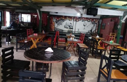 Coatepeque Apartment | Hades Metal Bar
