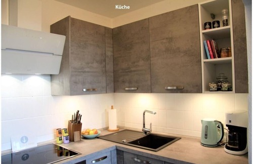 Orth Apartment | Hafenblick Orth: Modern apartment with good sea view, balcony and fitness room