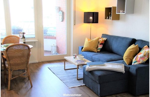 Orth Apartment | Hafenblick Orth: Modern apartment with good sea view, balcony and fitness room