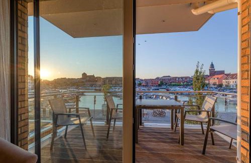 Muritz Apartment | Hafenidylle - Apartment in der Hafenresidenz mit Balkon & Wellness