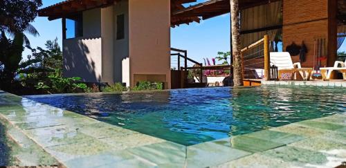 Prumirim House | Haleiwa chalés e suítes - A Guest House do Prumirim