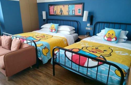 Erqi District Hotel | Happy Inn-Zhengzhou Railway St ation Erqi Square Branch喜鹊愉家酒店锦荣国际轻纺城店