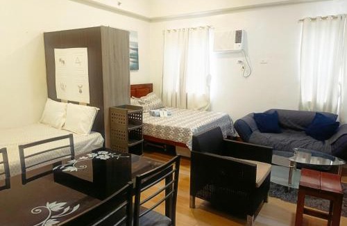 Trece Martires Hotel | Happy Stays A - 300mbps - 65"TV NetFlix, Disney - Washer