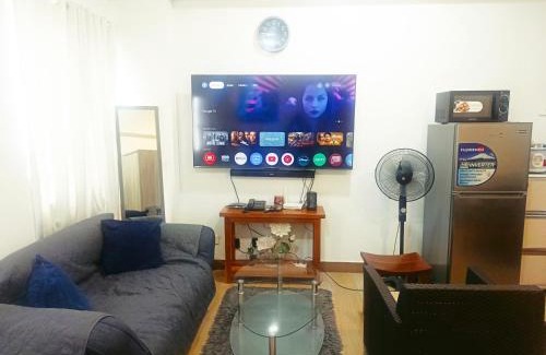 Trece Martires Hotel | Happy Stays A - 300mbps - 65"TV NetFlix, Disney - Washer