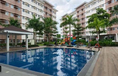 Trece Martires Apartment | Happy Stays B - 300mbps - 65"TV Netflix, Disney - Washer