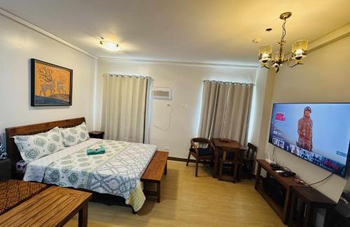 Trece Martires Apartment | Happy Stays E - Sunset View at SMDC Hope Residences