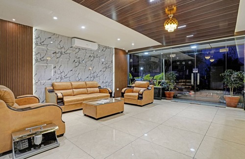Palm Meadows Hotel | Happy Stays