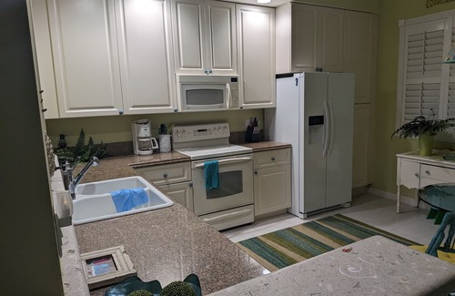 Fort Pierce Condo | Harbour Isle Penthouse Gem overlooking the marina within minutes to the beaches.