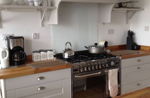 Helmsdale House | Harbourside large detached house with enclosed garden