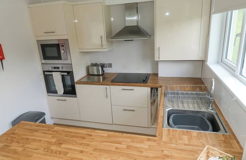 Heligan House | HARCOMBE HOUSE BUNGALOW 1, pet friendly, with pool in Chudleigh