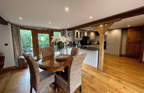 Longtown House | Hatterrall Barn - Luxury Barn Conversion With Hot Tub, Garden and Mountain Views