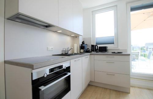 Groemitz Apartment | Haus Barbara - Schwimmbad und Sauna im Haus-Whg 11
