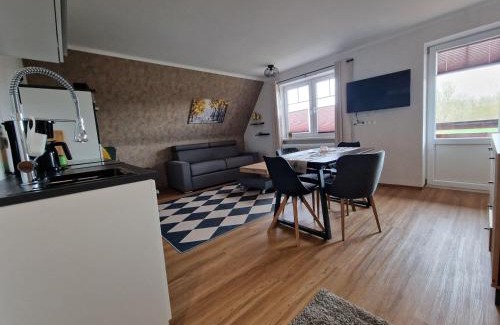 Albertsdorf Apartment | Haus-Fehmarn-am-Dorfteich-|-Wohnung-1-Sued