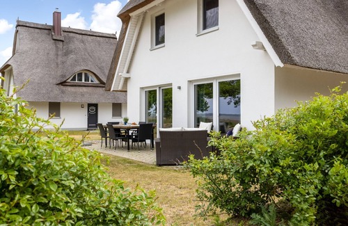 Am Salzhaff Cottage | Haus Heimathafen with fireplace, sauna and sea view, OFC 35 - Haus Heimathafen with