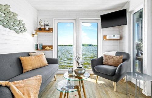 Schleswig Boat Rental | Hausboot Glücksmomente mit Dachterrasse in Schleswig am Ostseefjord Schlei